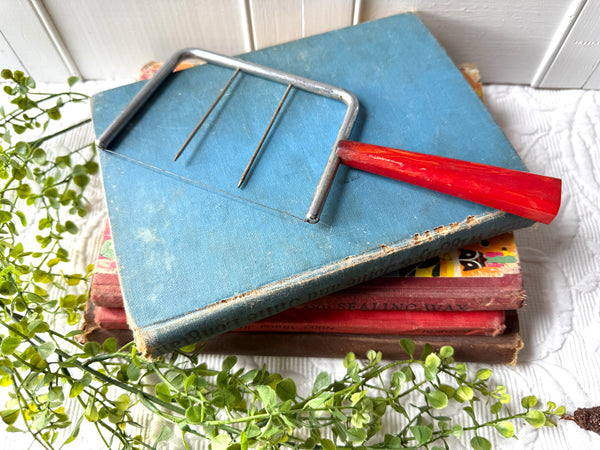 Vintage Red Handled Cheese Slicer